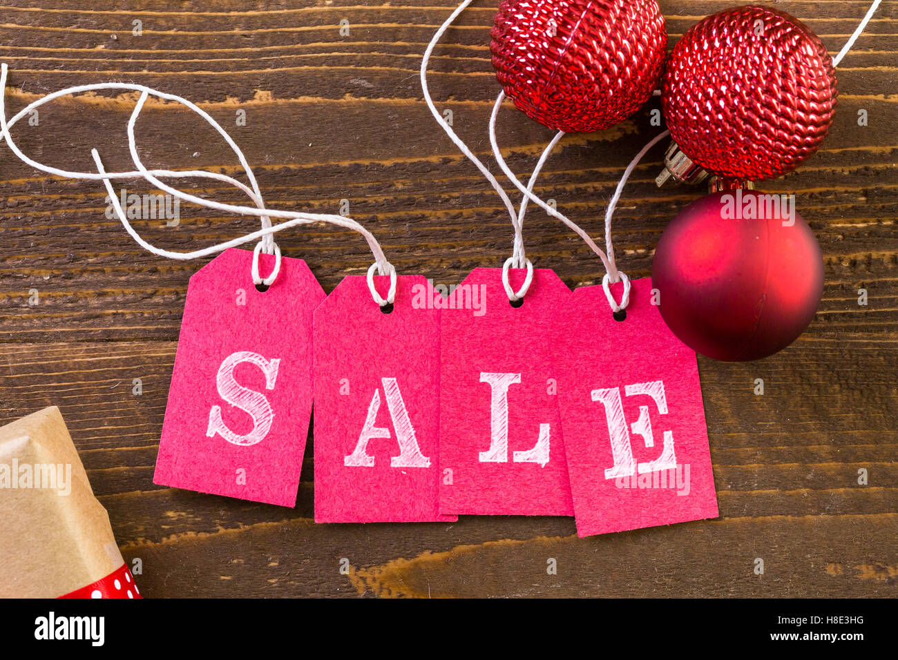 Tags with sale sign on wood board Stock Photo Alamy