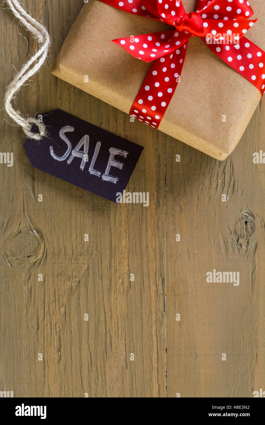 Tags with sale sign on wood board Stock Photo Alamy