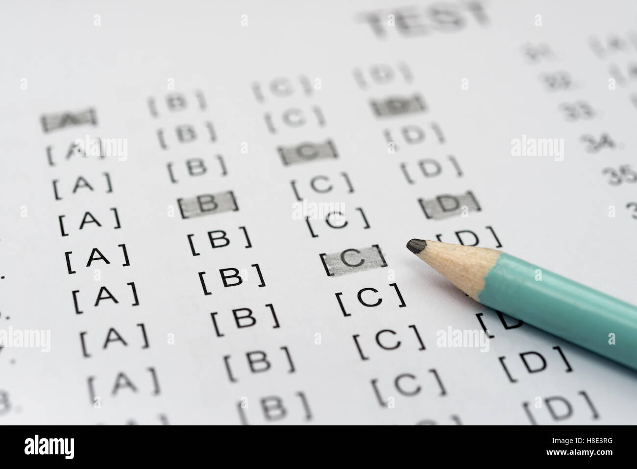 test score sheet partly filled by pencil Stock Photo