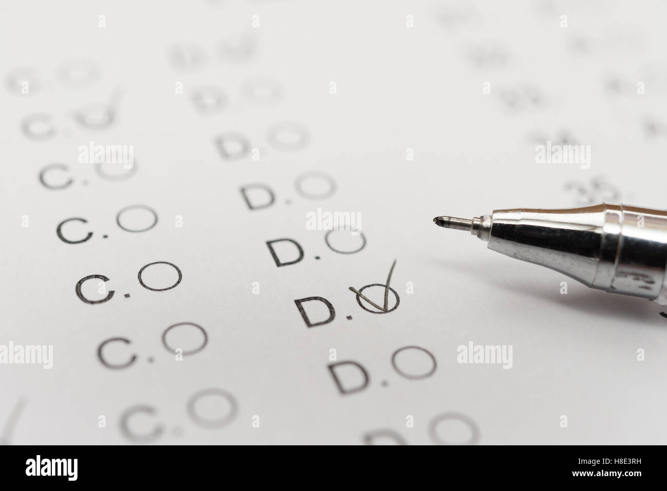 test score sheet with answers and ballpoint close up Stock Photo