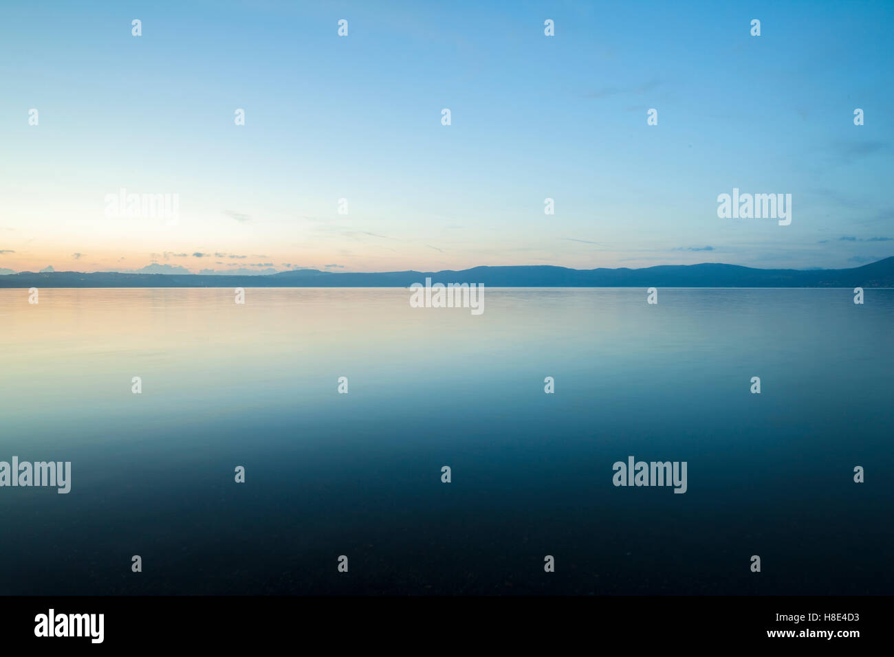 Hazy blue lake sunset hi-res stock photography and images - Alamy