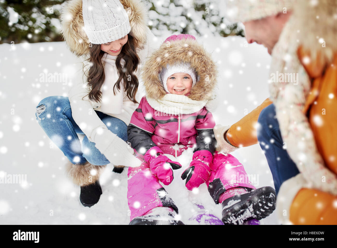 happy family with sled walking in winter outdoors Stock Photo - Alamy