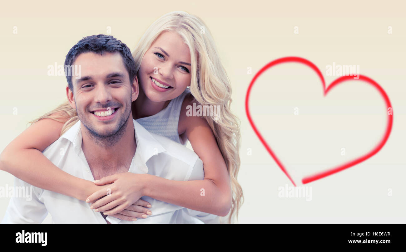 happy couple having fun over beige background Stock Photo - Alamy