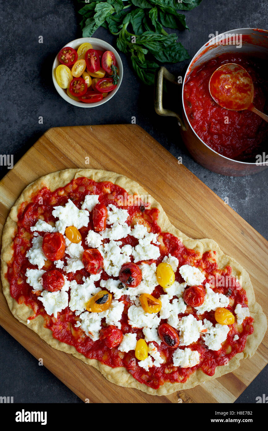 Roasted Tomato Pizza with a thin Olive Oil Cracker Crust. Photographed