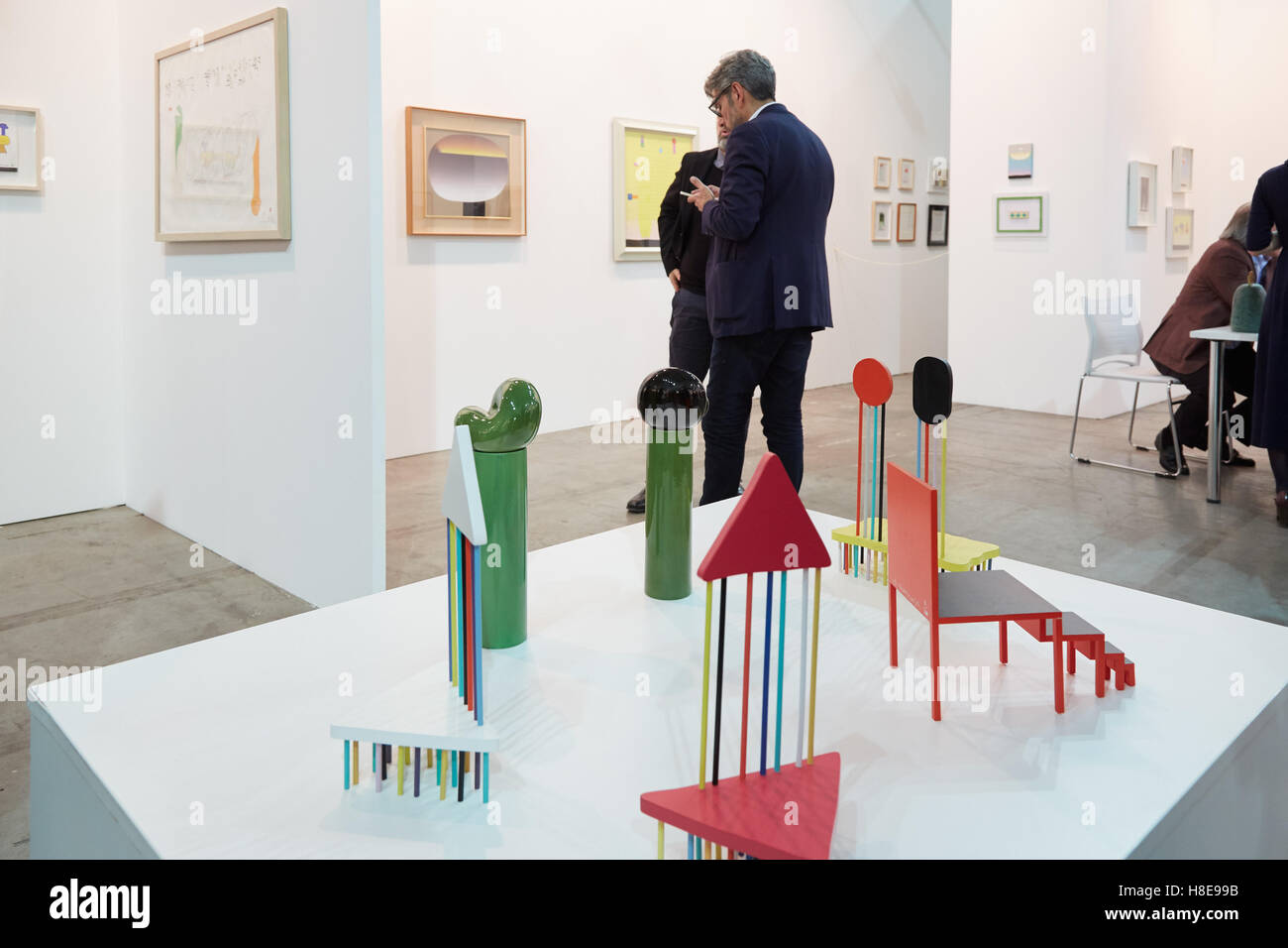Colorful sculptures during Artissima, contemporary art fair opening with people, galleries and art collectors Stock Photo