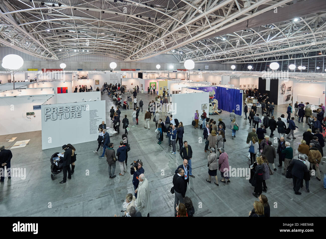 Artissima, contemporary art fair opening with people, galleries and art collectors, high angle view Stock Photo