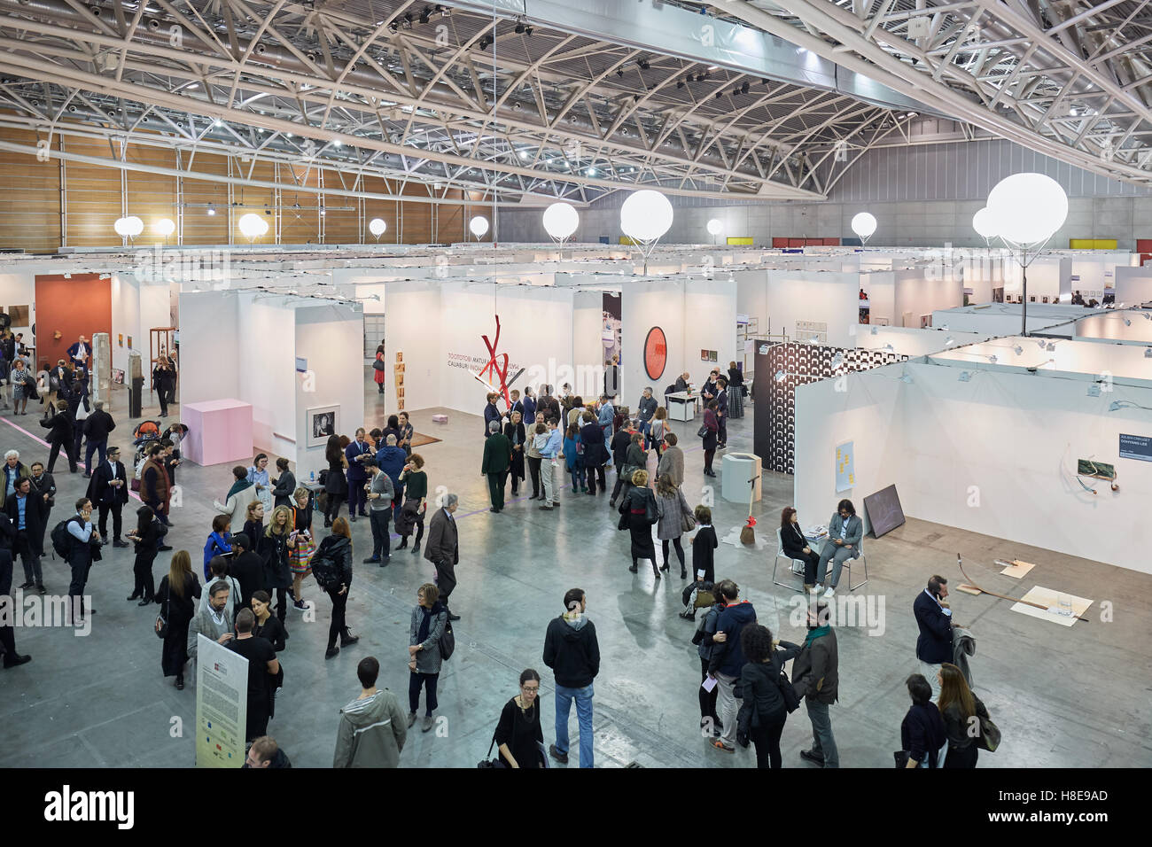 Artissima, contemporary art fair opening with people, galleries and art collectors, high angle view Stock Photo