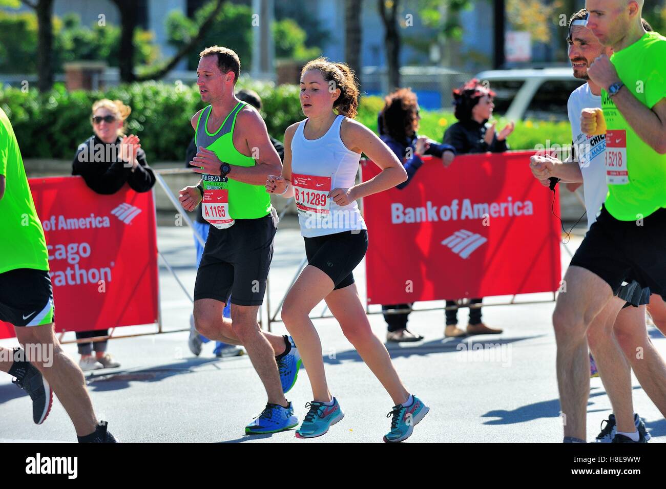 Men and women competing against the course and the clock much more than each other during the 2016 Chicago Marathon. Chicago, Illinois, USA. Stock Photo