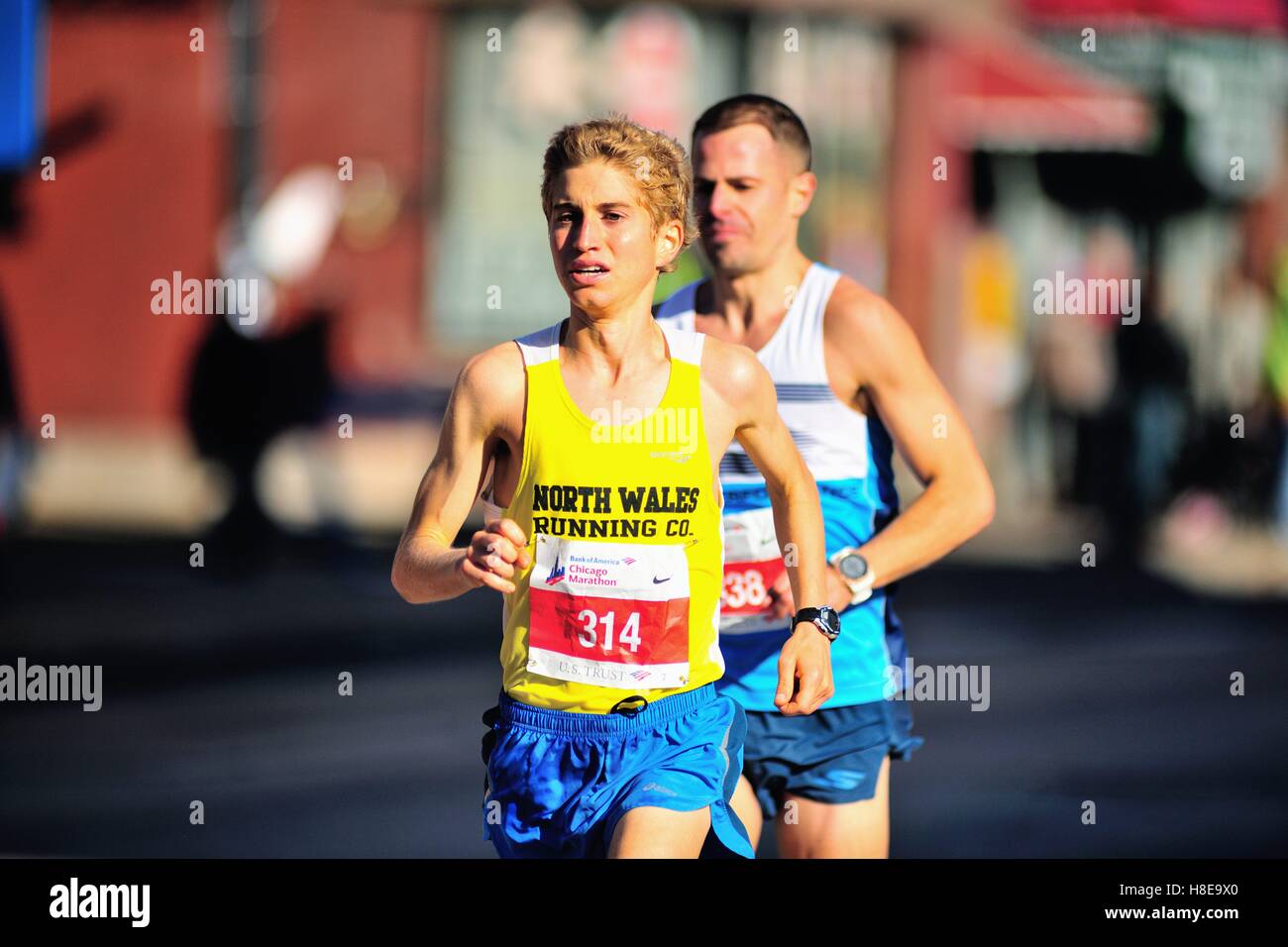 Zachary Hoagland of the United States during the 2016 Chicago Marathon as he ran through the city's Chinatown neighborhood. Chicago, Illinois, USA. Stock Photo