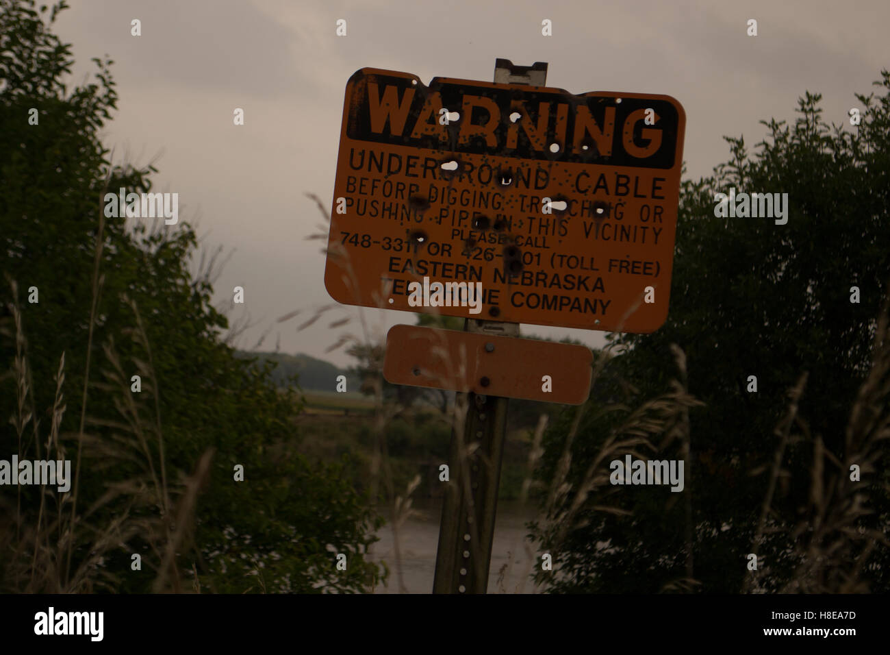 Warning, Buried Cable. Stock Photo