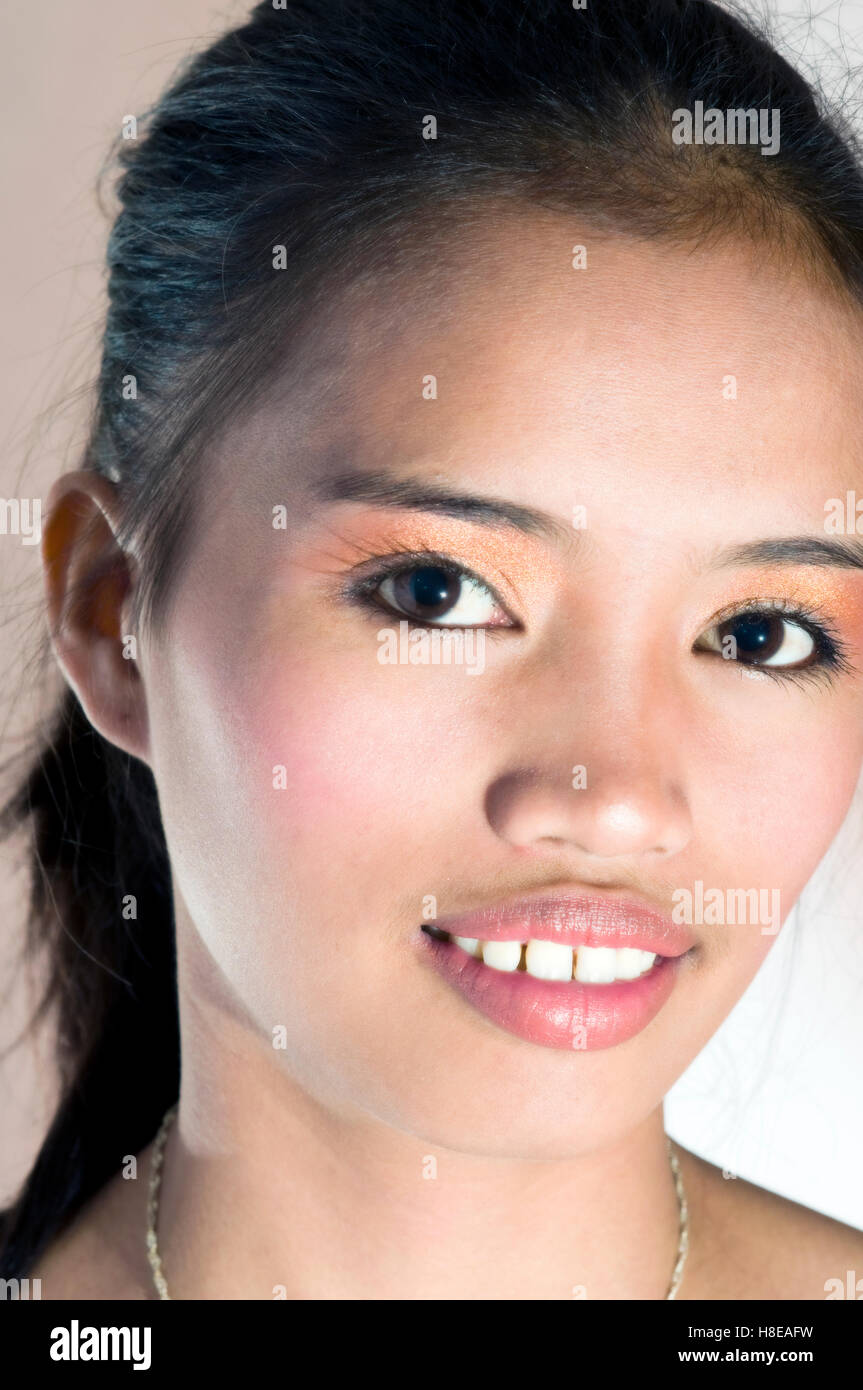 Portrait of young Asian woman Stock Photo - Alamy