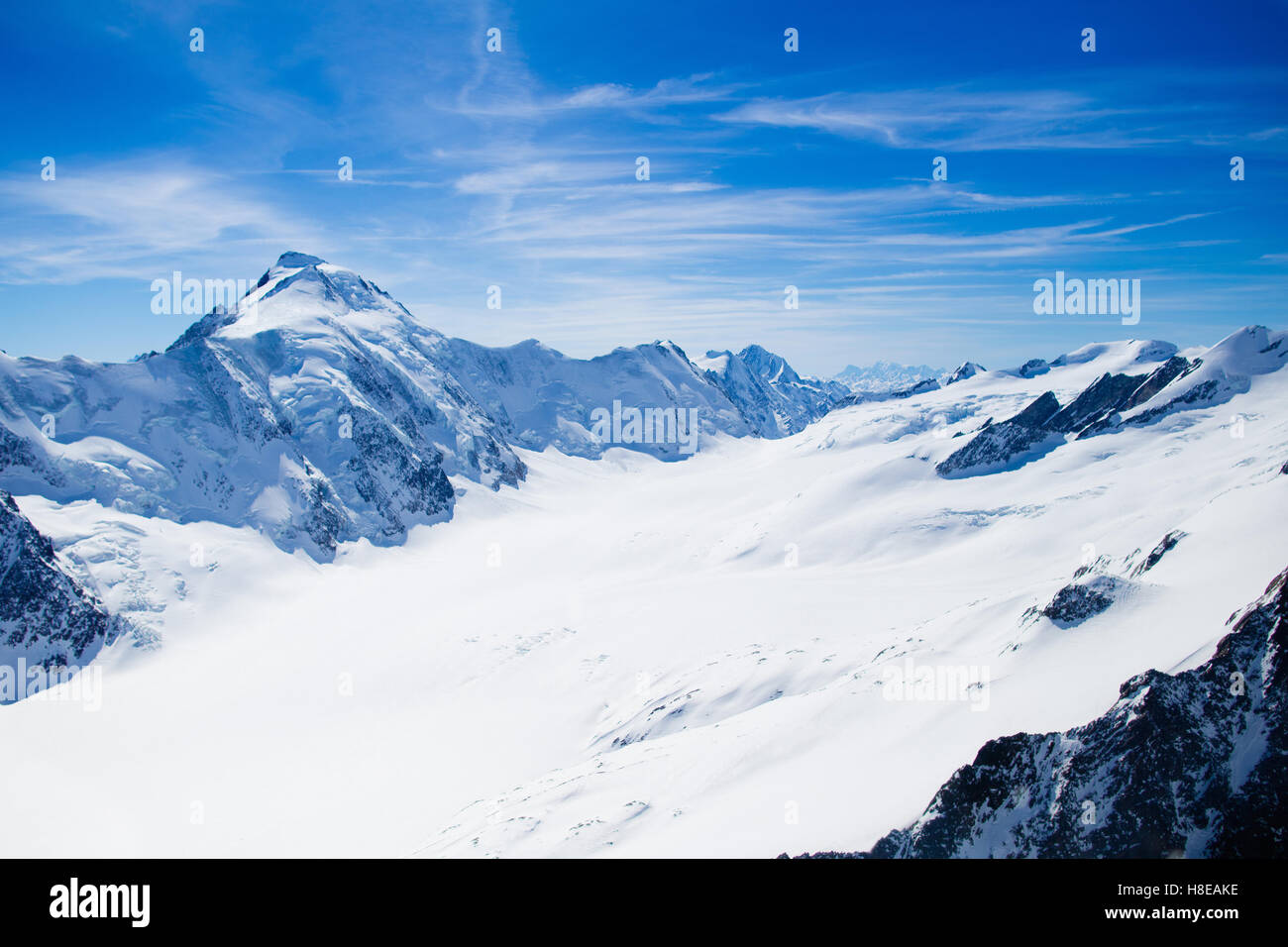 Aerial view of the Alps mountains in Switzerland. View from helicopter ...