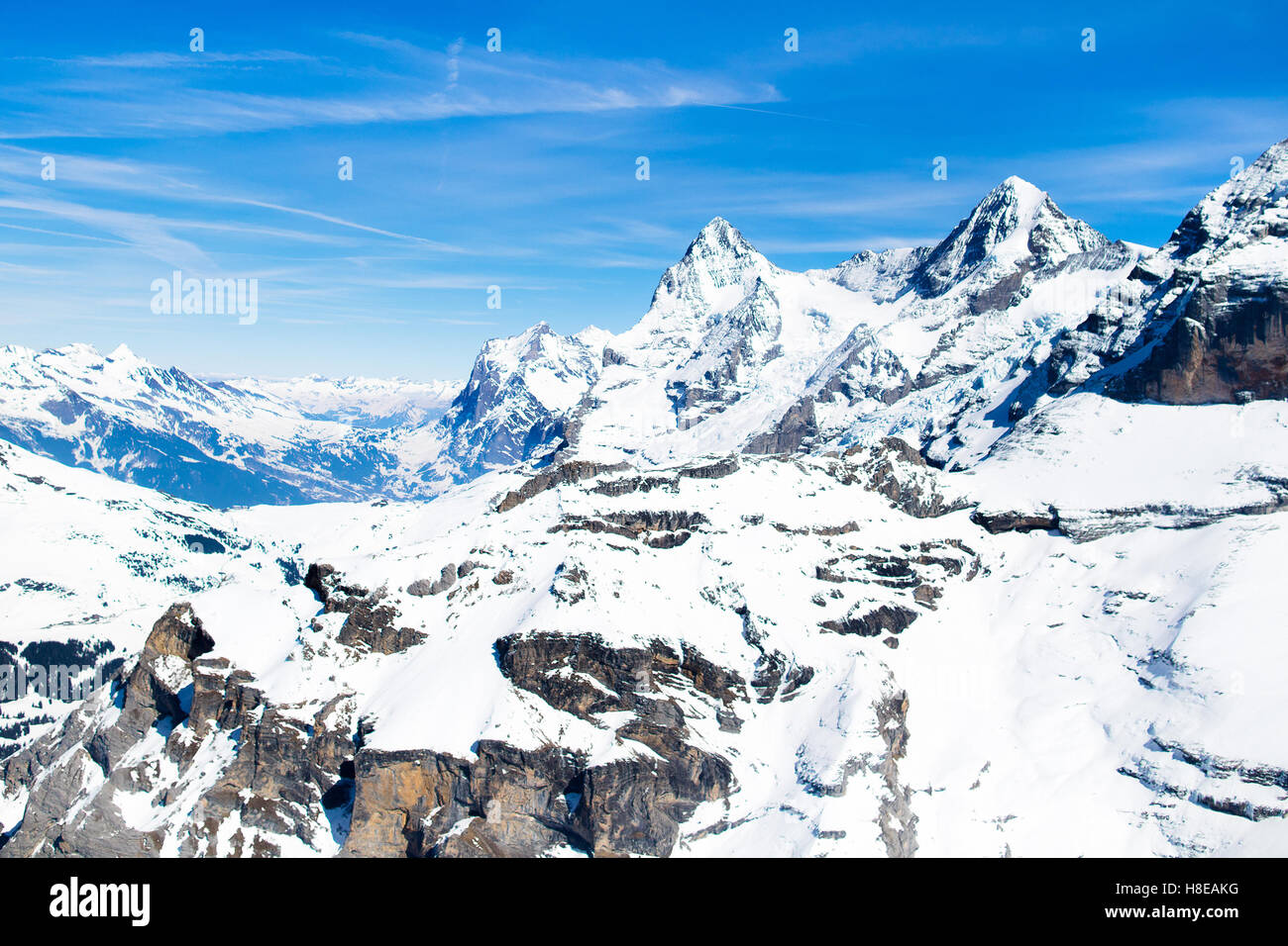 Aerial view of the Alps mountains in Switzerland. View from helicopter ...