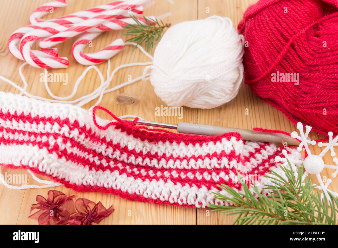 Crocheting Christmas winter red and white sweater Stock Photo