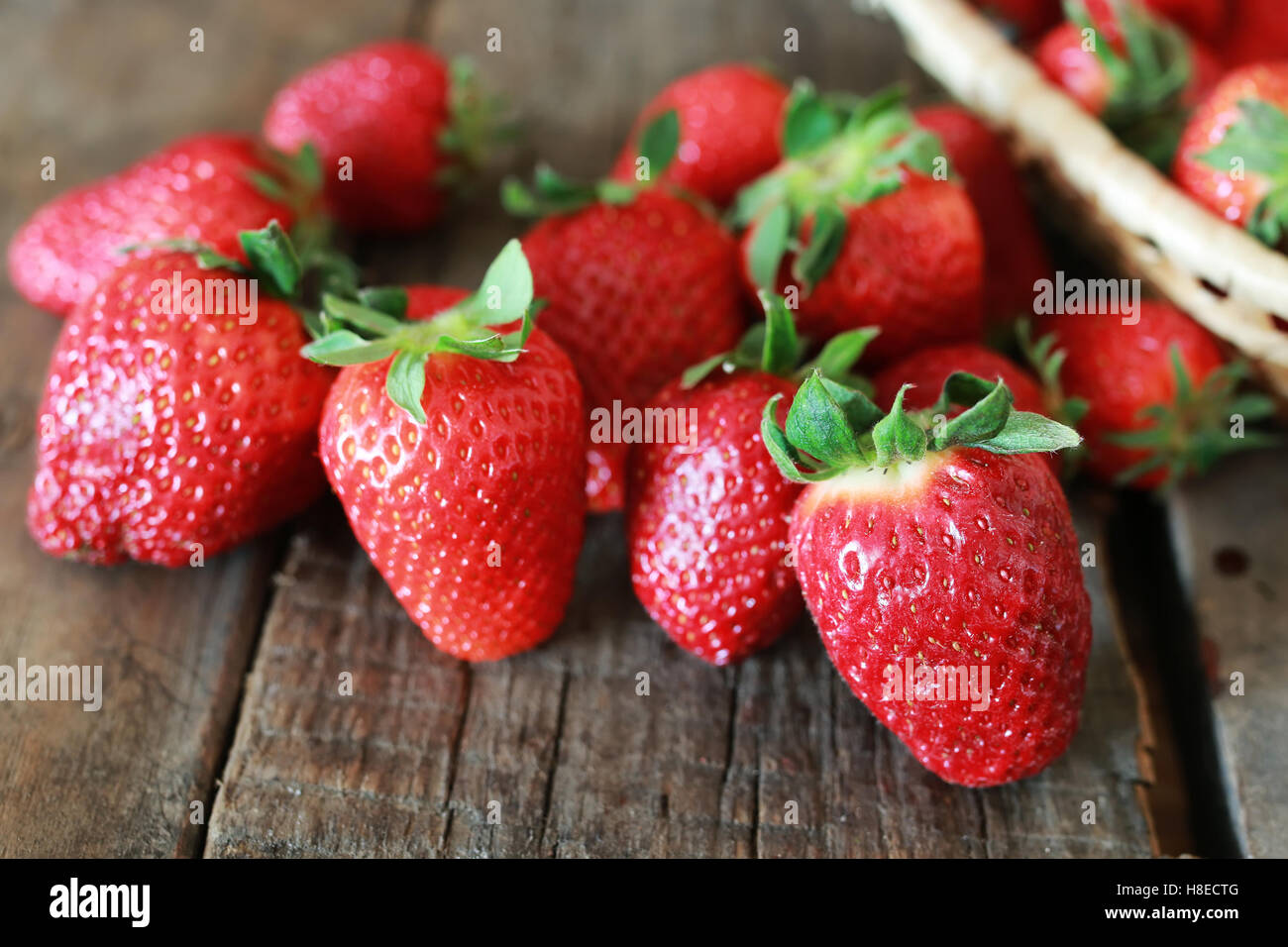 strawberries on a wooden background Stock Photo - Alamy