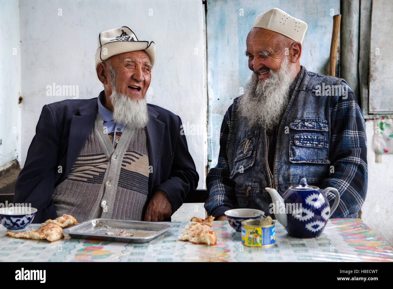 Kyrgyzstan - portrait of 2old man talking in Osh -  Travel people Central Asia - Silk Road Stock Photo