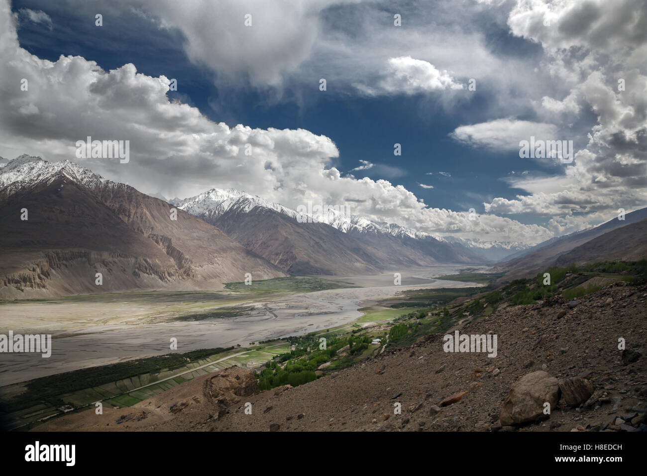 Landscape in Wakhan valley near Yamchun fort  - Tajikistan side - GBAO province - Afghanistan is at the other side of the river Stock Photo