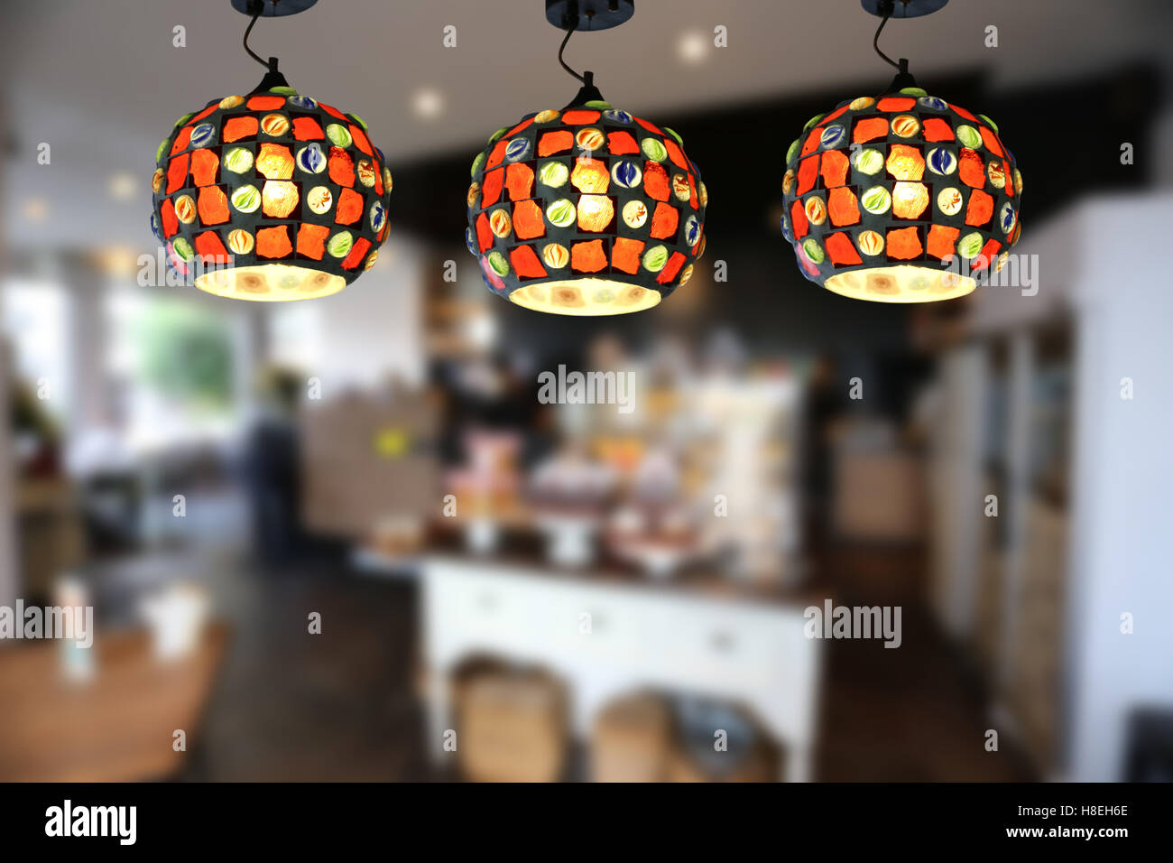 Warm lighting modern ceiling lamps in the cafe and interior decoration ...