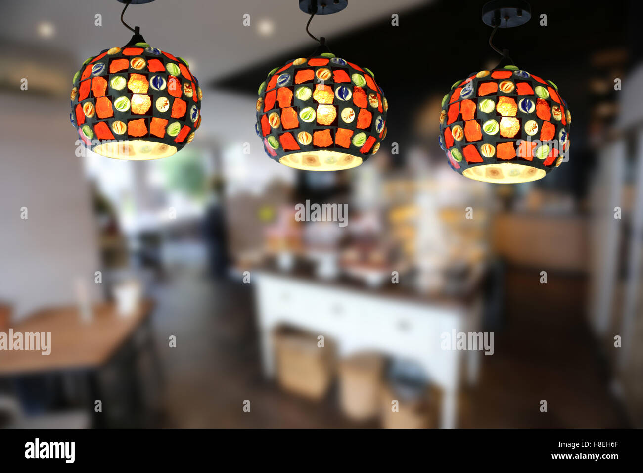 Warm lighting modern ceiling lamps in the cafe and interior decoration ...