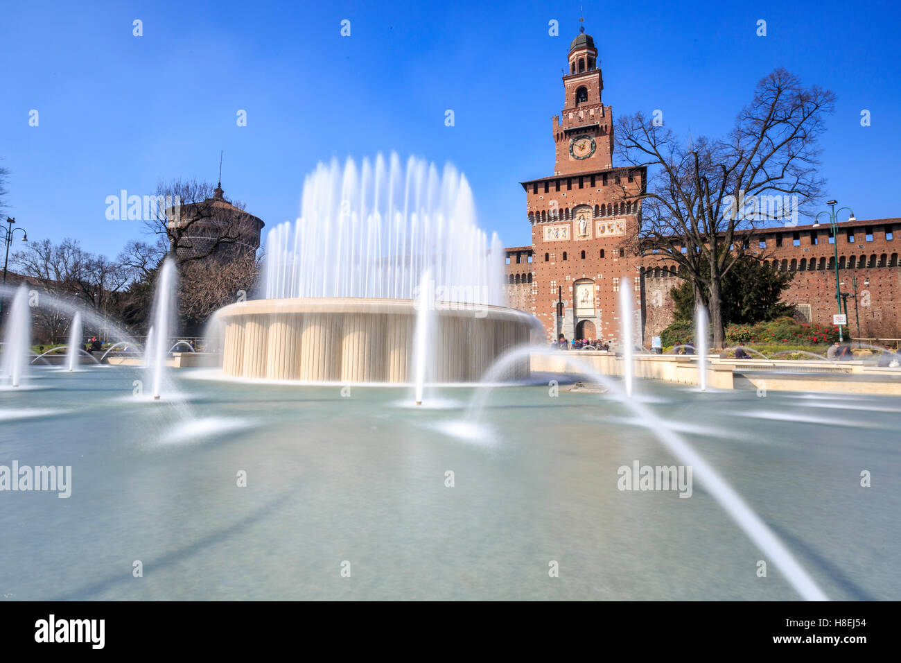 The fountain frames the ancient Sforza Castle, Milan, Lombardy, Italy, Europe Stock Photo