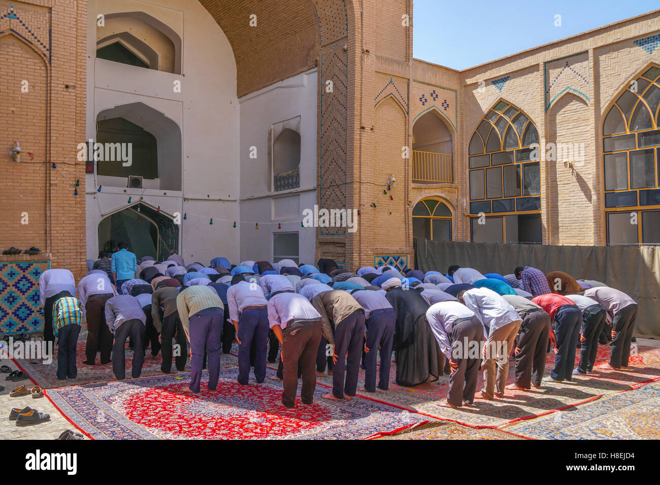 Men praying, Men's Section, Jameh Mosque, Varzaneh, Iran, Middle East Stock Photo