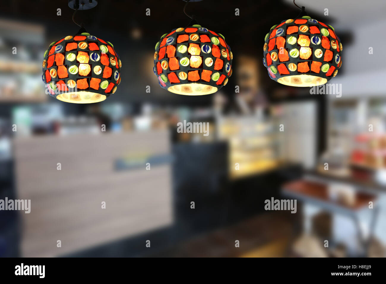Warm lighting modern ceiling lamps in the cafe and interior decoration ...