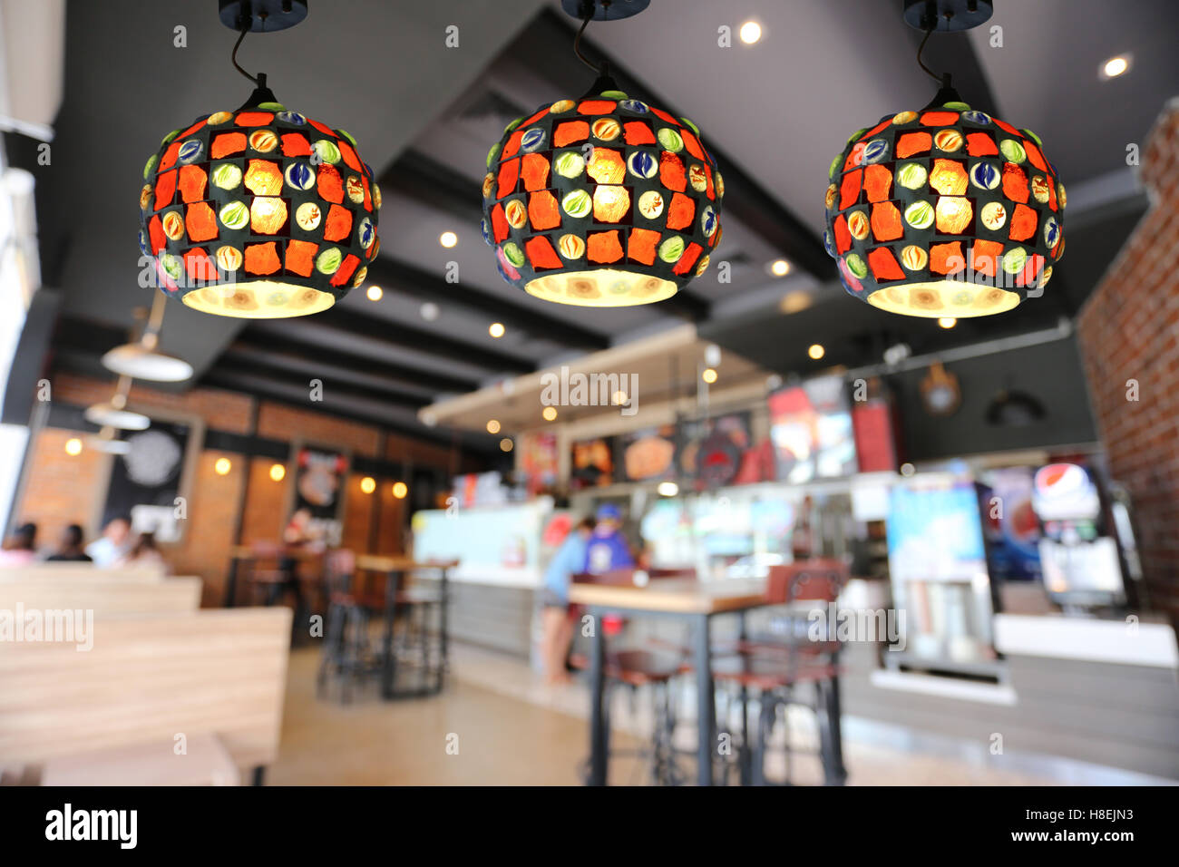 Warm lighting modern ceiling lamps in the cafe and interior decoration ...
