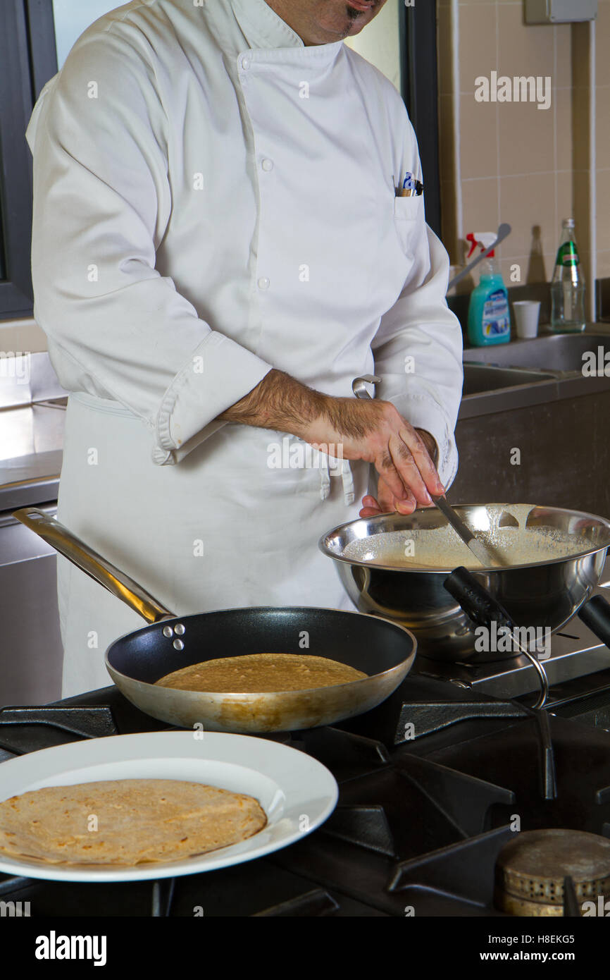 Working Condition Cook cook at work in a kitchen restaurant Stock Photo - Alamy