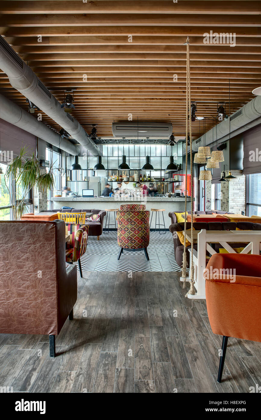 Restaurant with open kitchen Stock Photo - Alamy