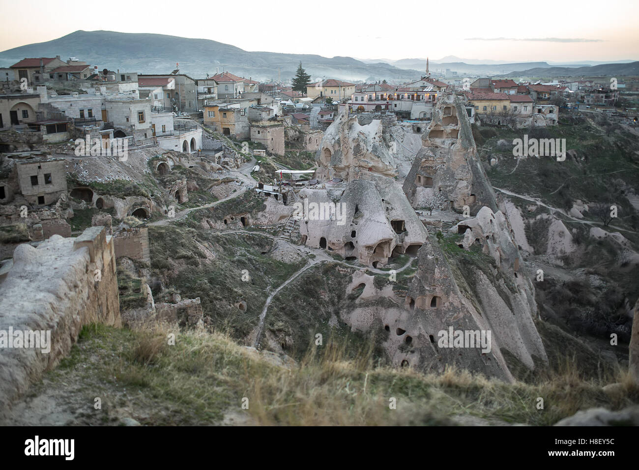 Houses carved into rock Stock Photo - Alamy