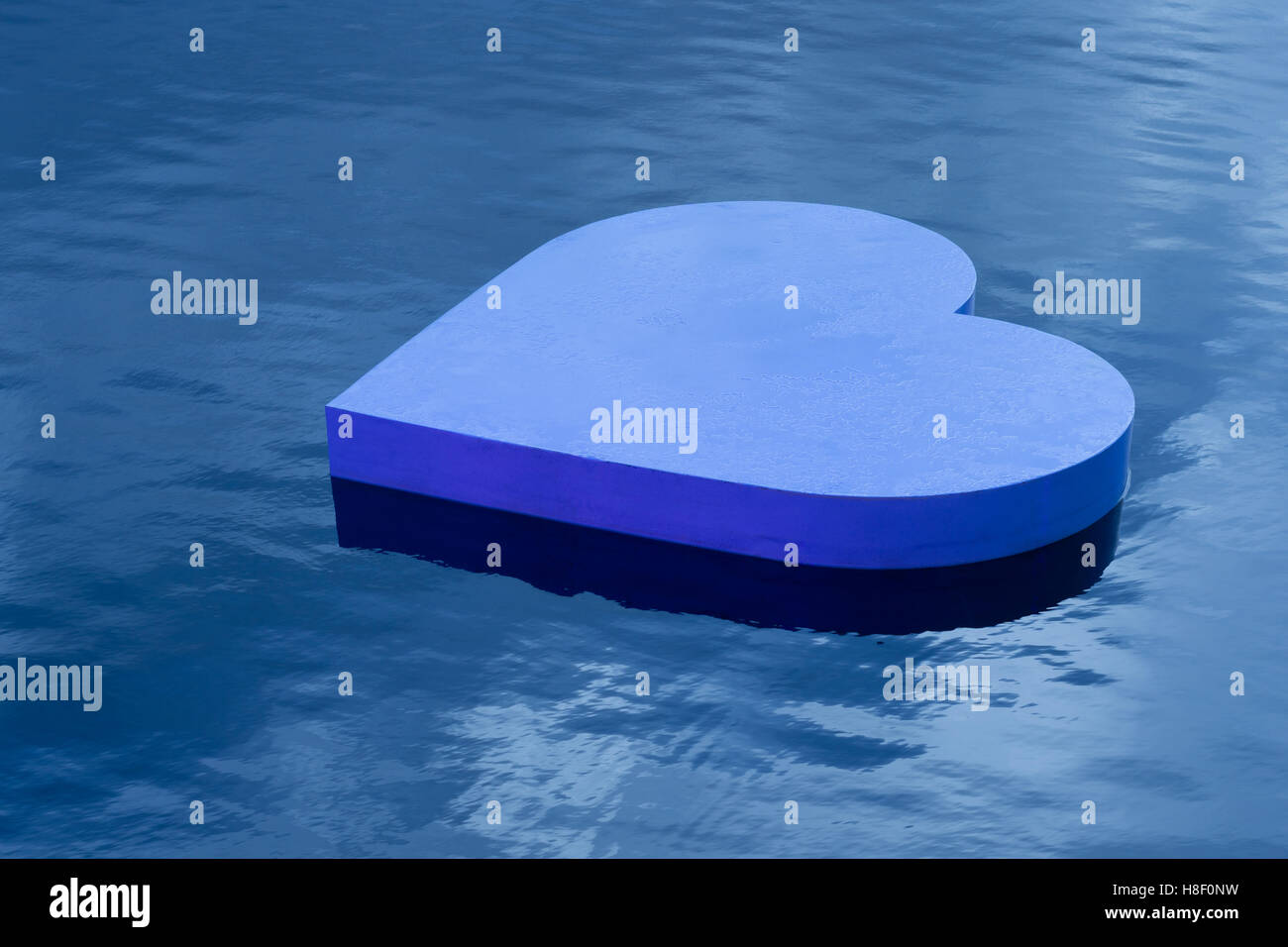 A heart shape floating on water Stock Photo - Alamy