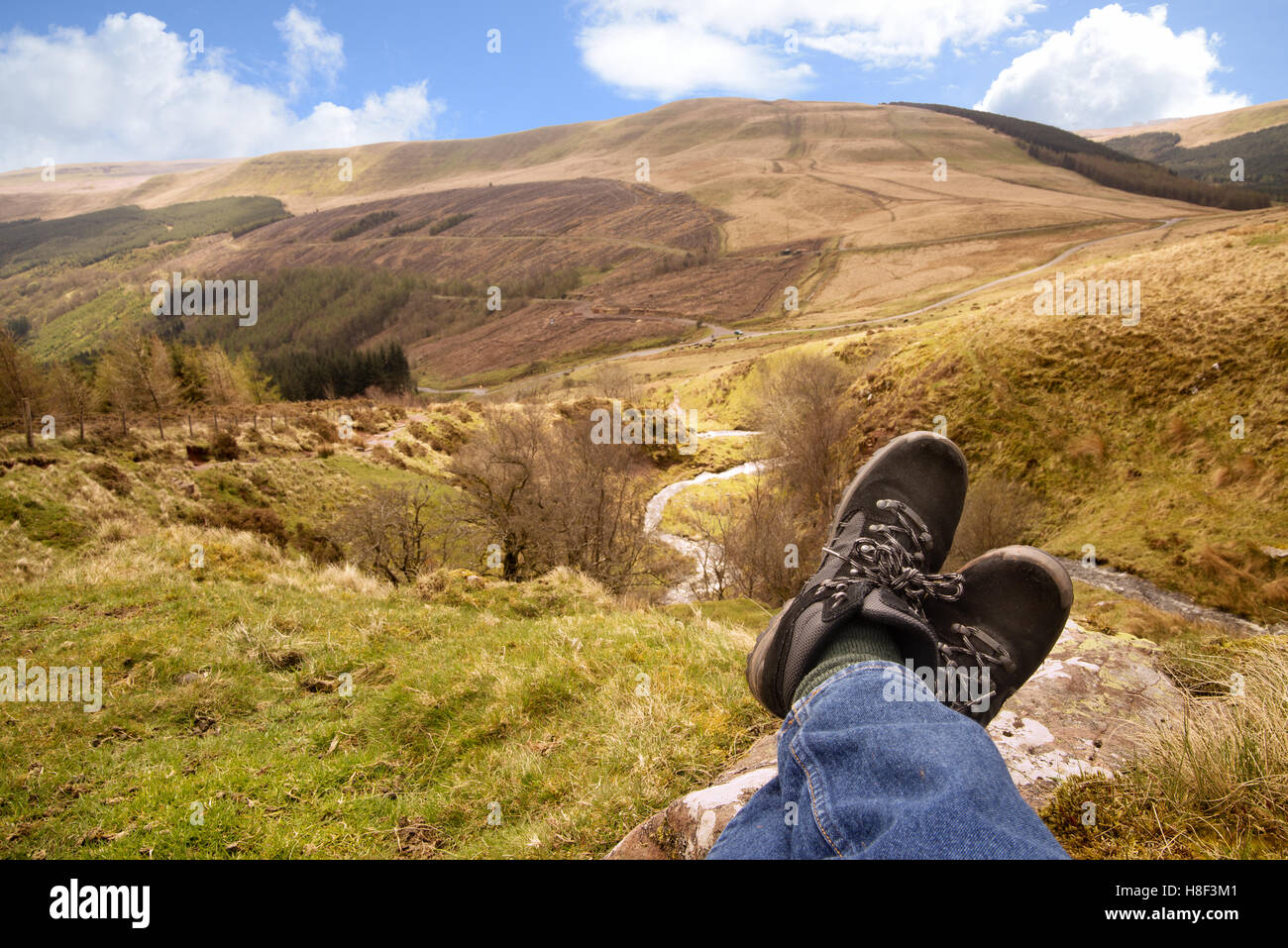resting after hiking up side of welsh mountain Stock Photo