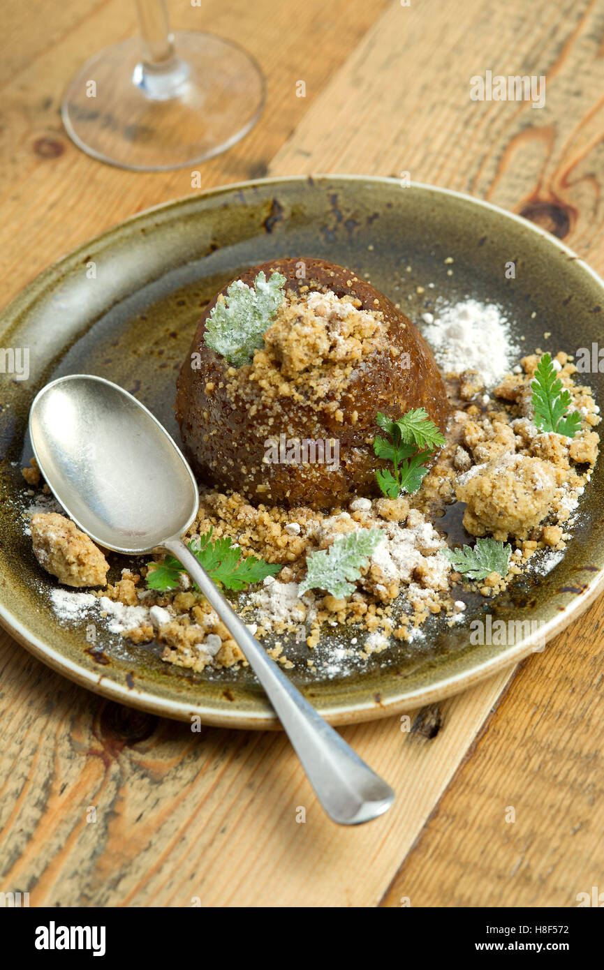 Ethicurian sticky toffee apple cake pudding. a UK food Stock Photo
