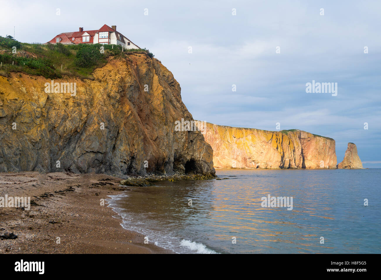 Cliff and mansion at Perce, QC, CA Stock Photo Alamy