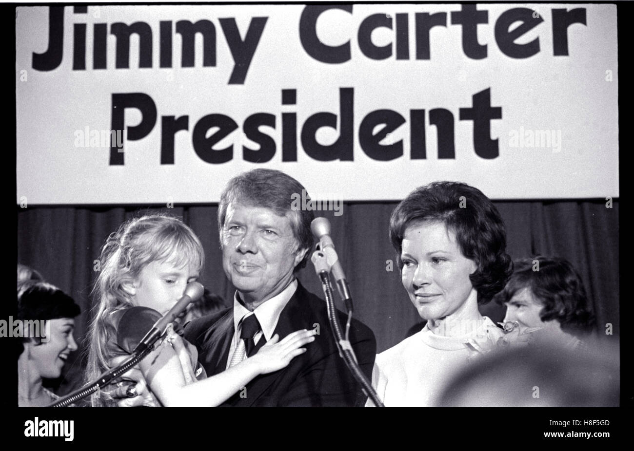 Nearing the end of his term in state office, Georgia Governor Jimmy Carter announces his candidacy for president of the United States in 1974. The announcement was made at the Atlanta Civic Center. Carter stands with his wife, Rosalynn and holds his daughter, Amy as he makes the announcement. Stock Photo