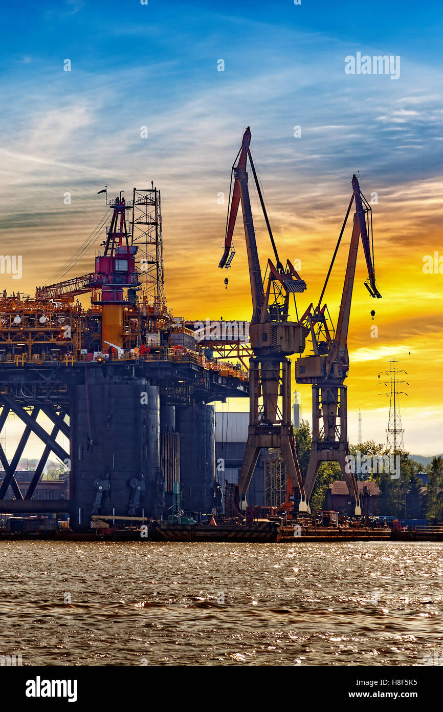 Oil rig under construction at sunset in Gdansk, Poland. Stock Photo