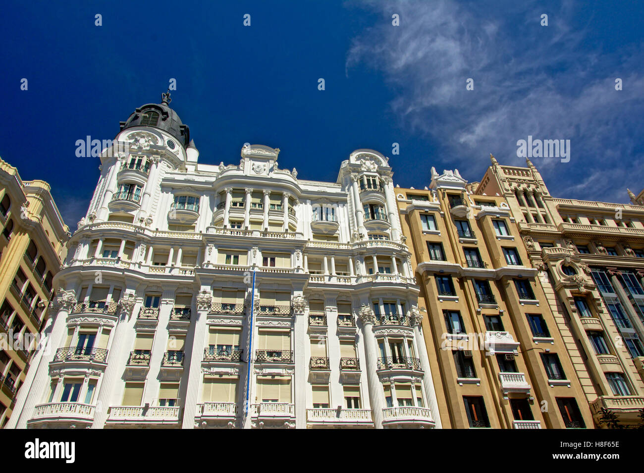 Facade of a famous hotel in neoclassical style on Gran Via in Madrid, Spain Stock Photo