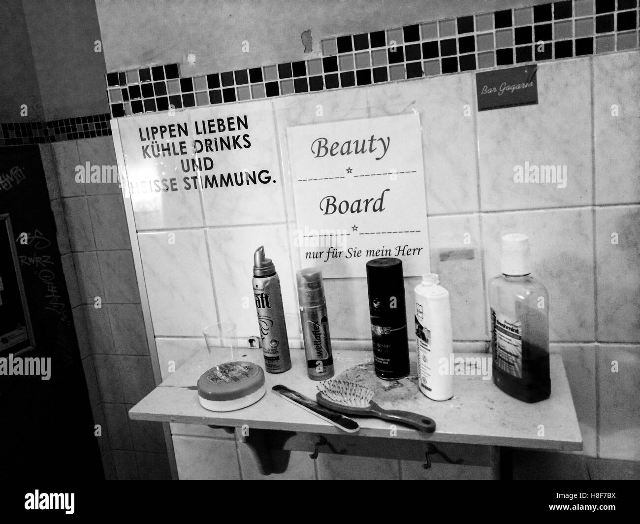 Hairdressing tools in pub washroom, Kollwitz neighborhood, Berlin, Germany Stock Photo