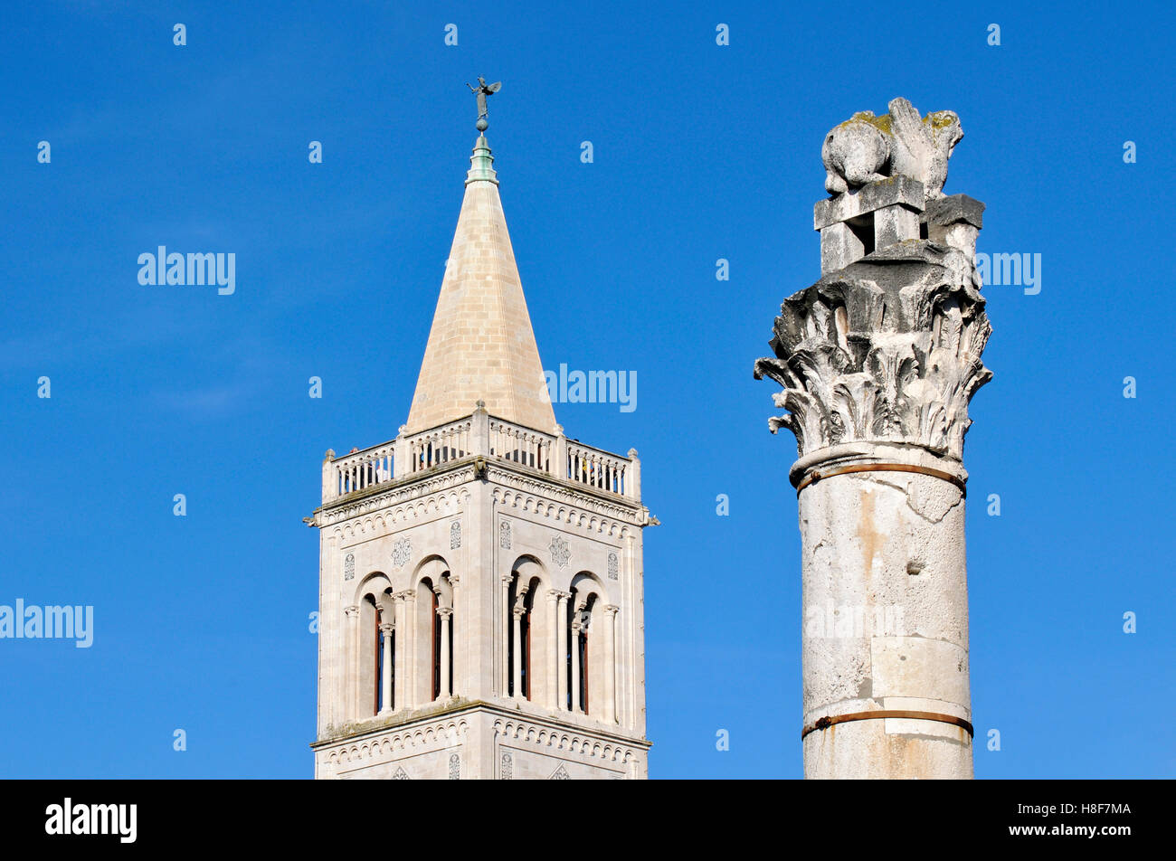 Detail of Campanile, bell tower, of Cathedral of St Anastasia and Roman column at Forum of Zadar, Dalmatia, Croatia, Europe Stock Photo