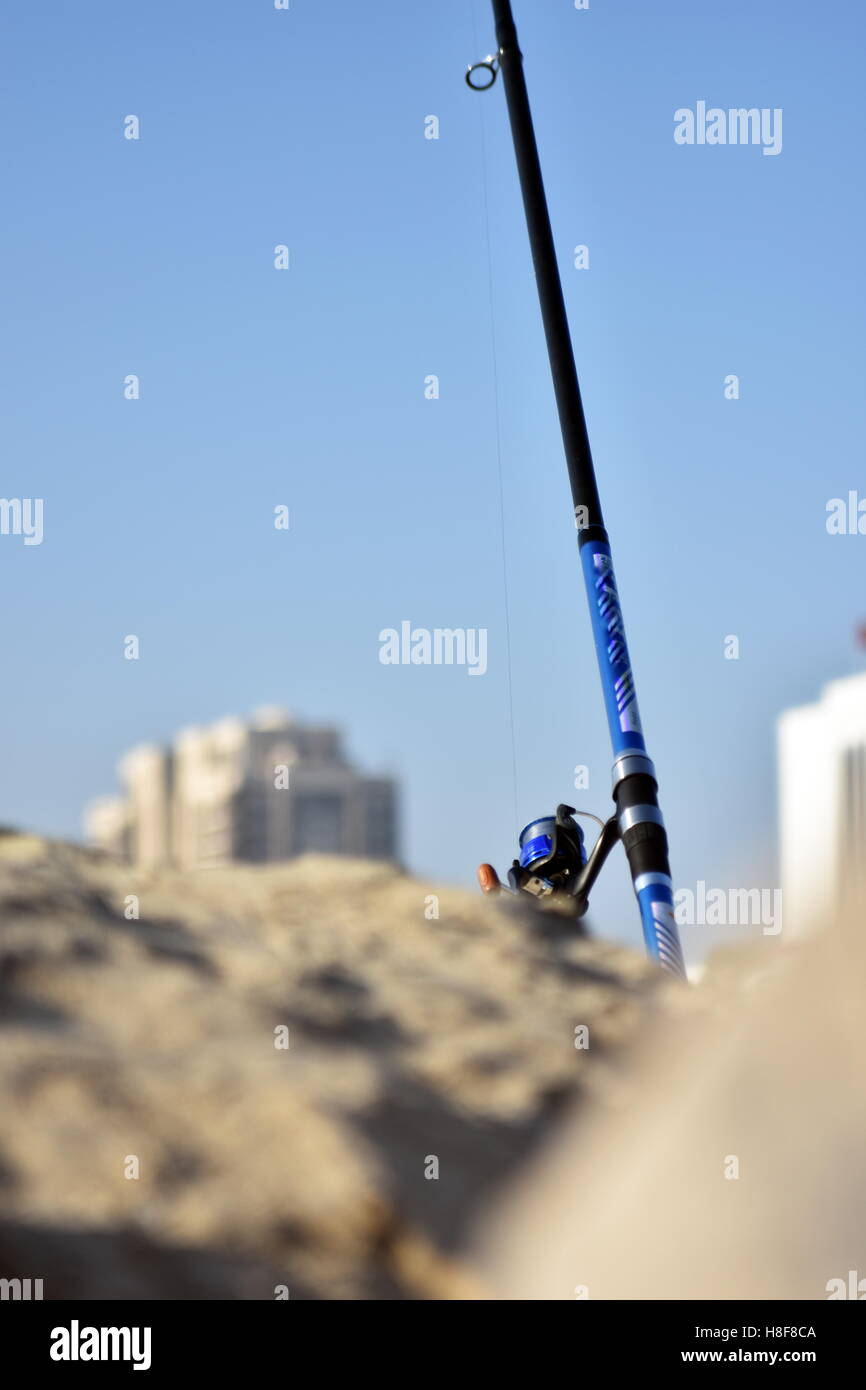 Fishing rod in Hamriyah free zone port, Ajman, United Arab Emirates