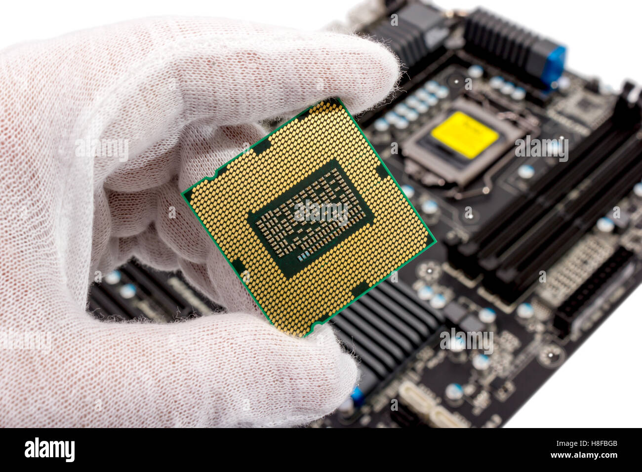 Electronic collection - The repairman holding CPU in hand before ...