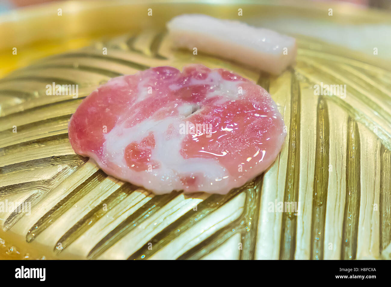 Kurobuta pork sliced on bar b q grill, Shallow DOF Stock Photo