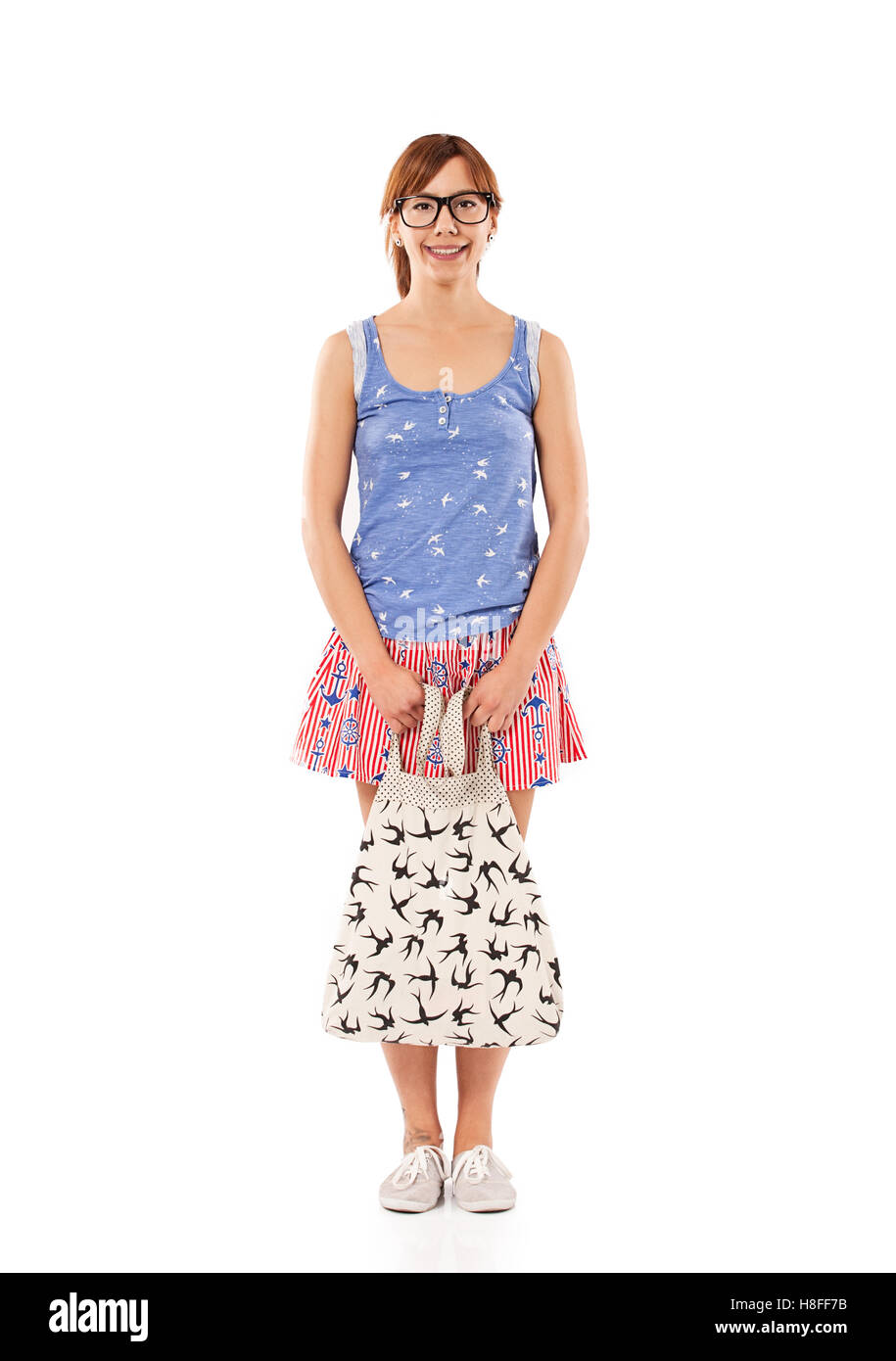 Cute girl posing with bag in studio Stock Photo Alamy