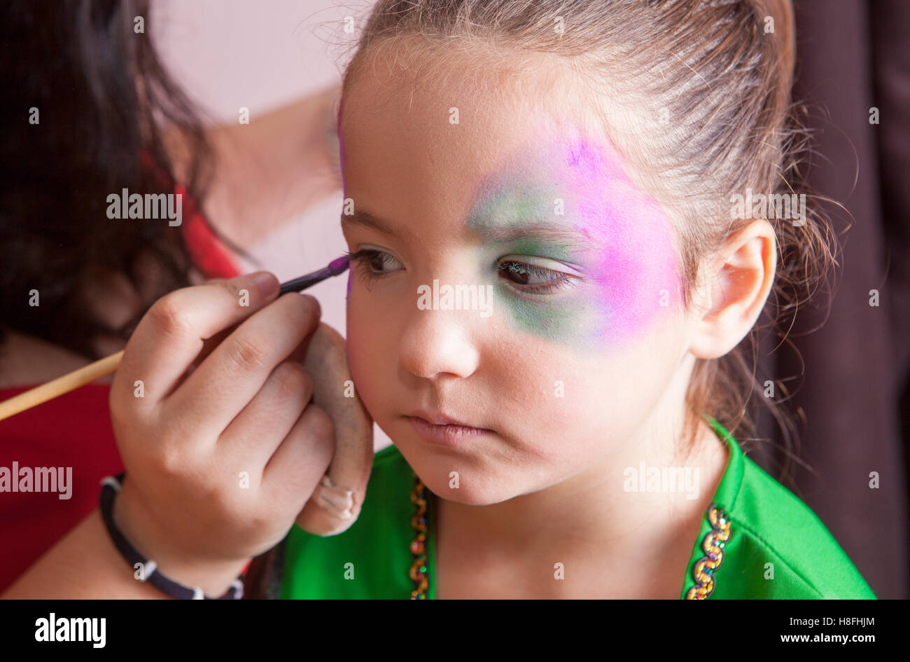 Ashaninka girl with red face paint Stock Photo - Alamy