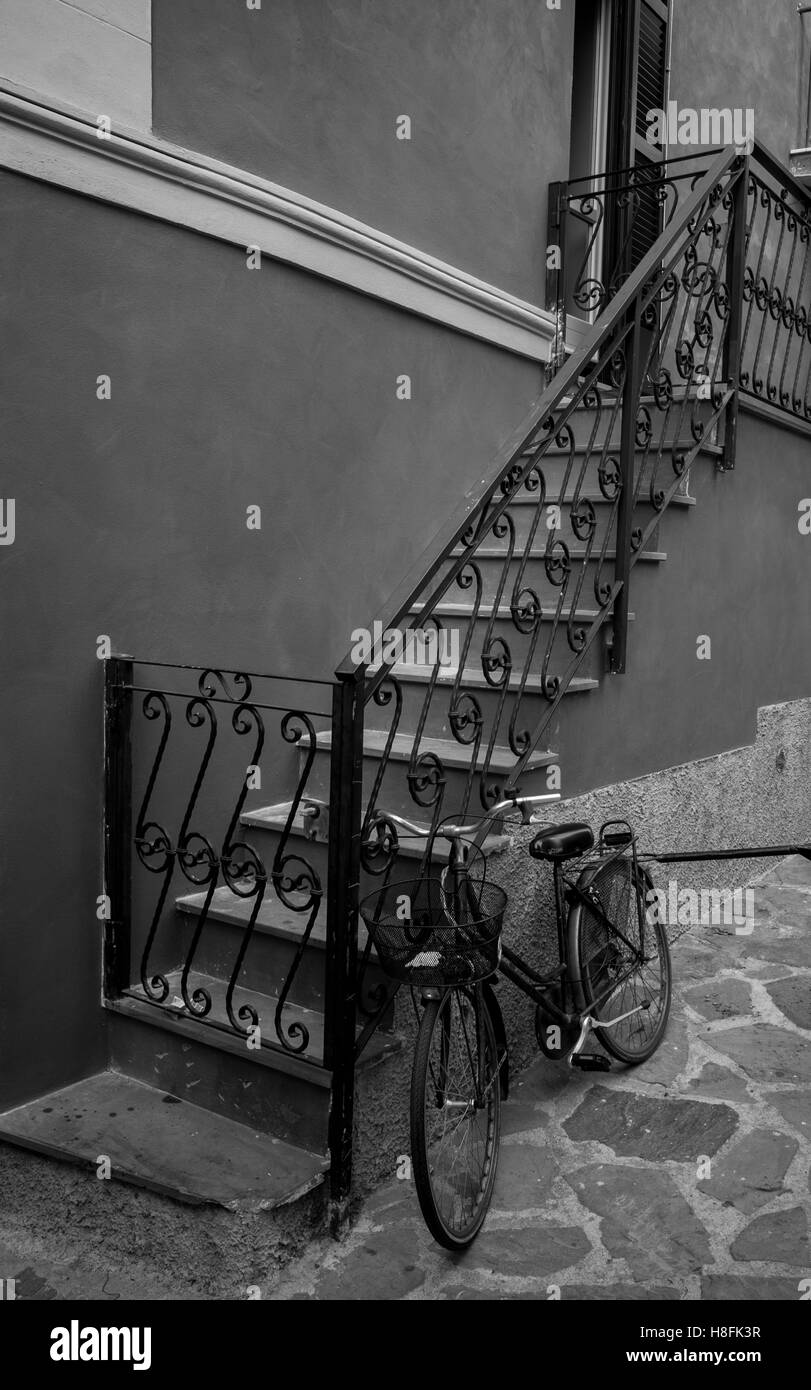 A traditional staircase in Monterosso Al Mare, Cinque Terre, September. Converted to black and white Stock Photo