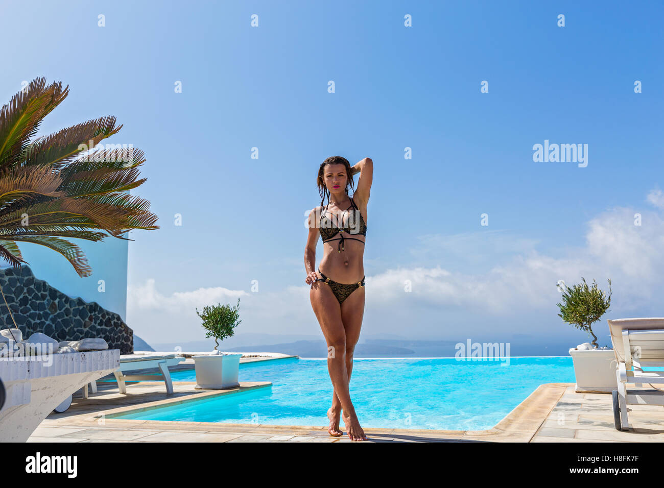 Beautiful woman in pool Stock Photo