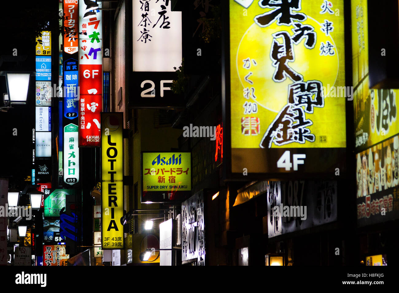 TOKYO, JAPAN Neon signs in the Shinjuku district. Stock Photo