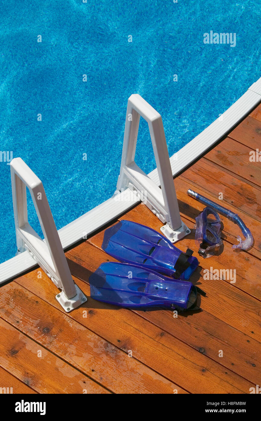 swimming gear at edge of pool Stock Photo
