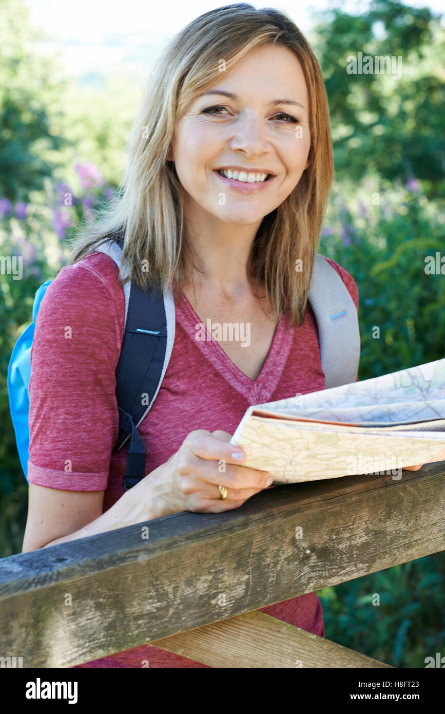 Portrait Of Mature Woman Hiking In Countryside Stock Photo - Alamy