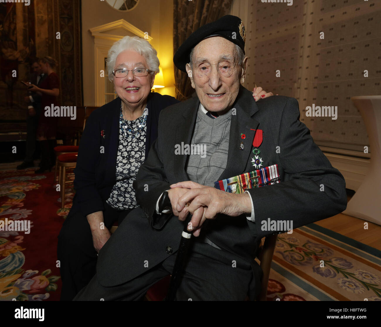 Lt (E) I Jack Freedman, 95, and his wife of 62 years Freda, 84, after a ceremony to honour British veterans with the L&Atilde;&copy;gion d&acirc;Â€Â™honneur for their role in the liberation of France, at the French Ambassador&acirc;Â€Â™s Residence in Kensington, London. Stock Photo